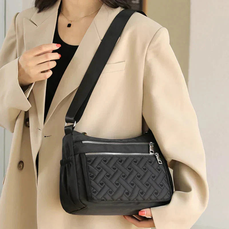 Aranya™ | Nylon shoulder bag with messenger style