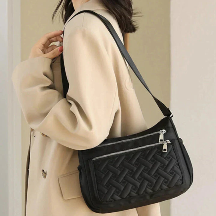 Aranya™ | Nylon shoulder bag with messenger style