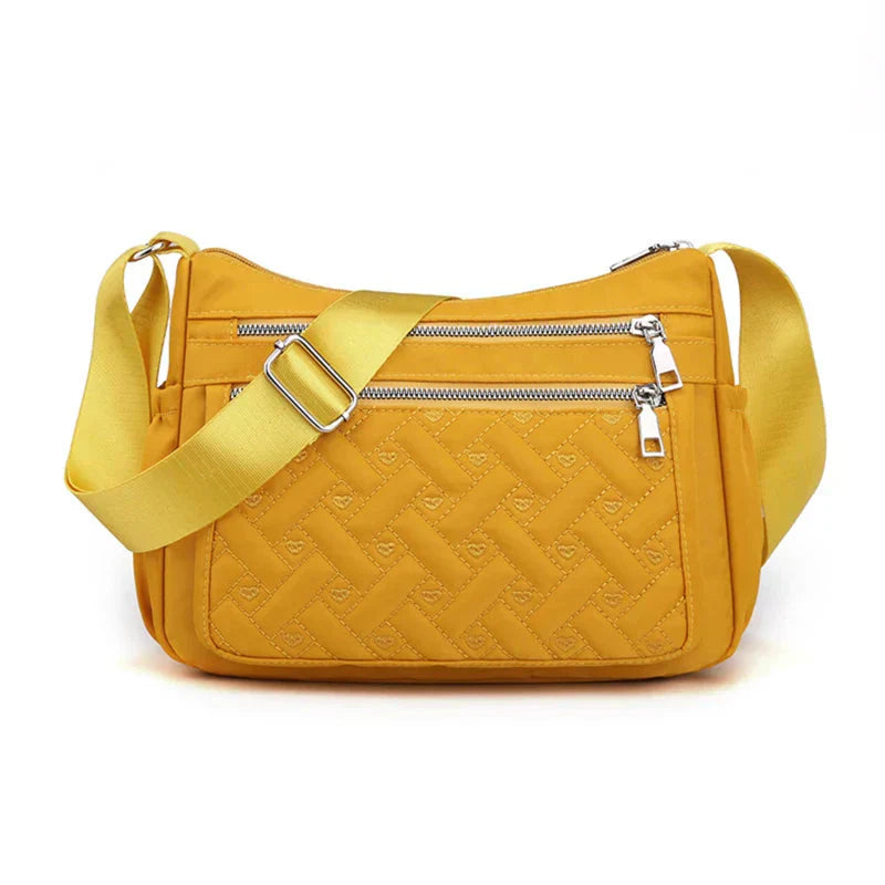 Aranya™ | Nylon shoulder bag with messenger style