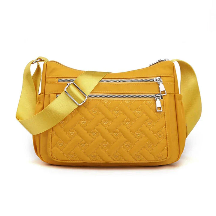 Aranya™ | Nylon shoulder bag with messenger style